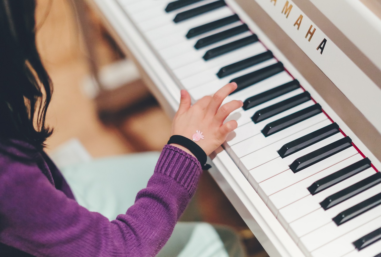 Dlaczego warto zapisać dziecko na zajęcia muzyczne?